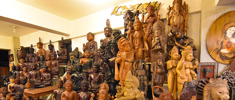 Thrills of Paradise 15 Highly Detailed Wood Carving Statues of Buddha and Hindu Deities in Sri Lanka